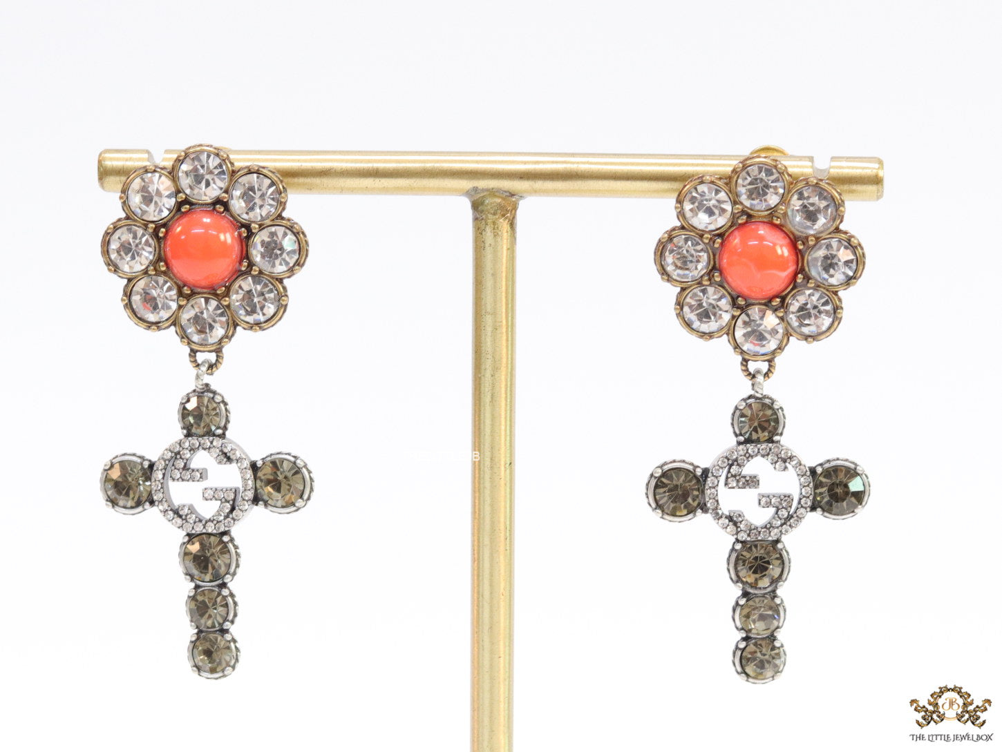 Floral cz and alphabet dangles with orange stone centre