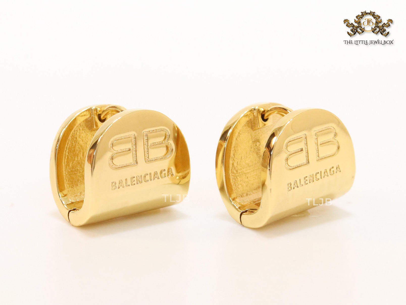 Gold double B studs