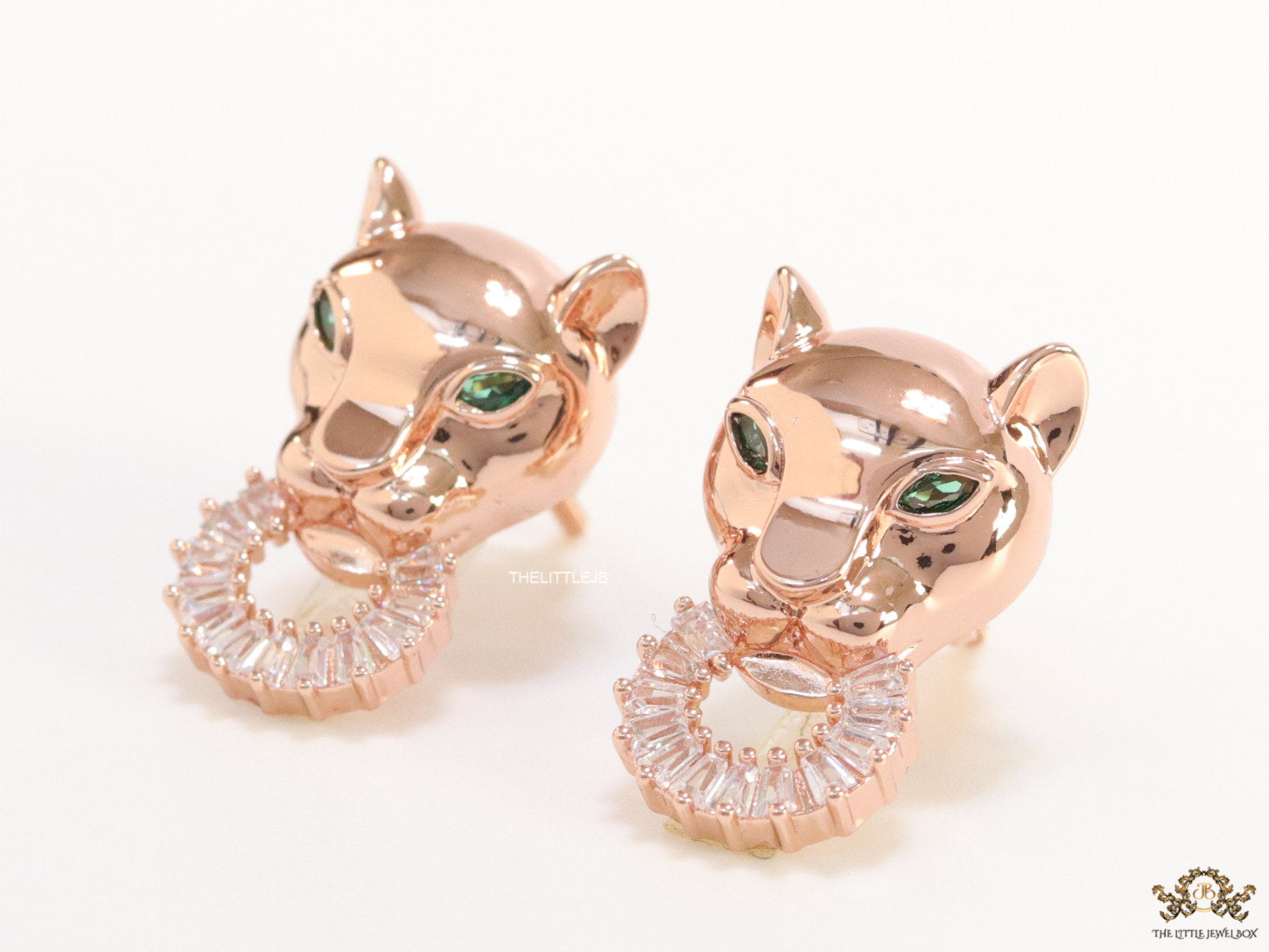 Rose gold panther face studs with cz baguette ring