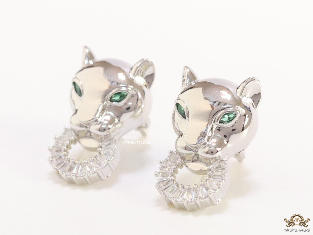 Platinum plated panther face studs with cz baguette ring