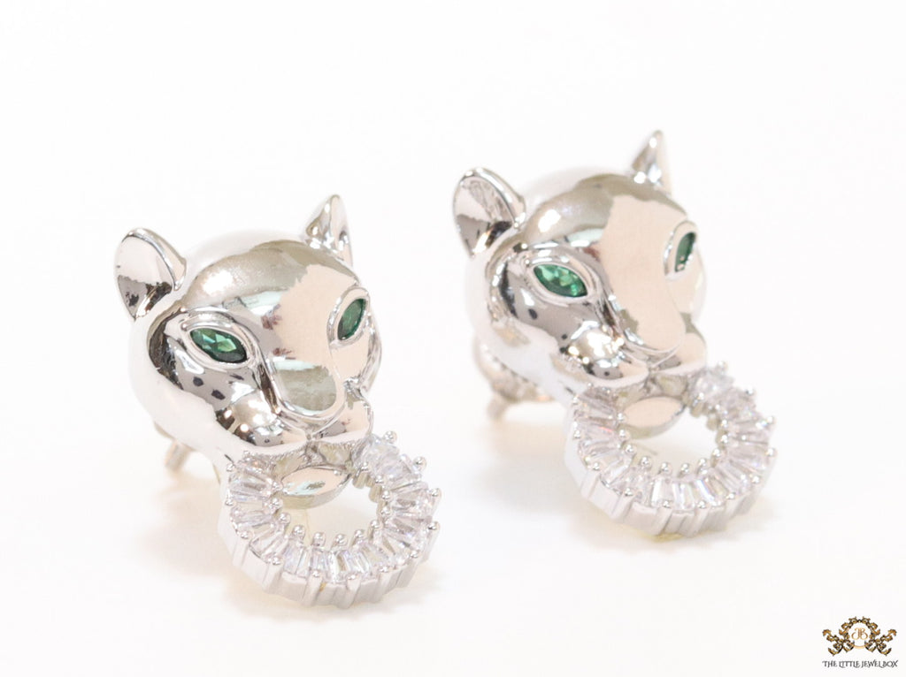 Platinum plated panther face studs with cz baguette ring