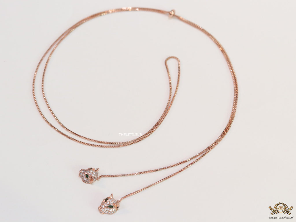 Rose gold plated knot necklace with twin cz panther pendants