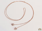 Rose gold plated knot necklace with twin cz panther pendants