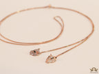 Rose gold plated knot necklace with twin cz panther pendants