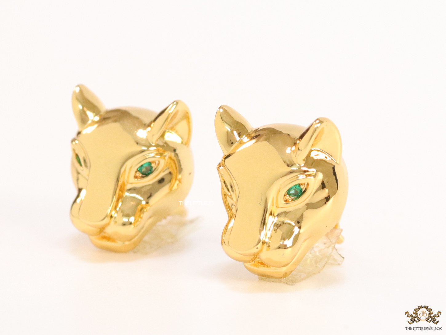 Golden panther face studs