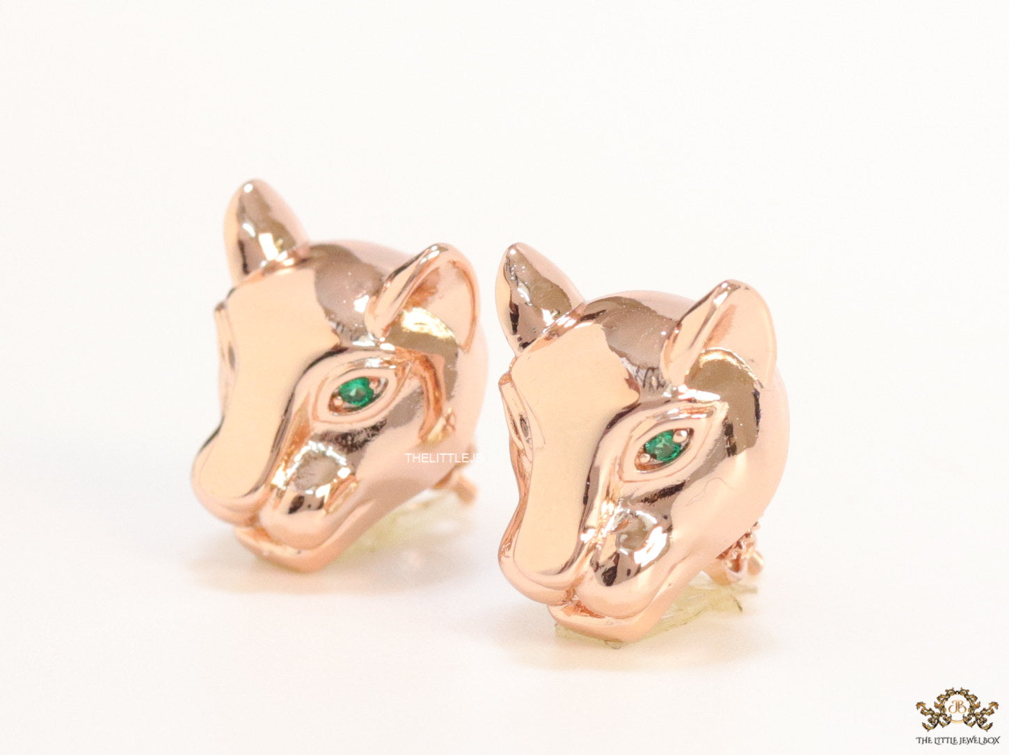 Rose gold panther face studs