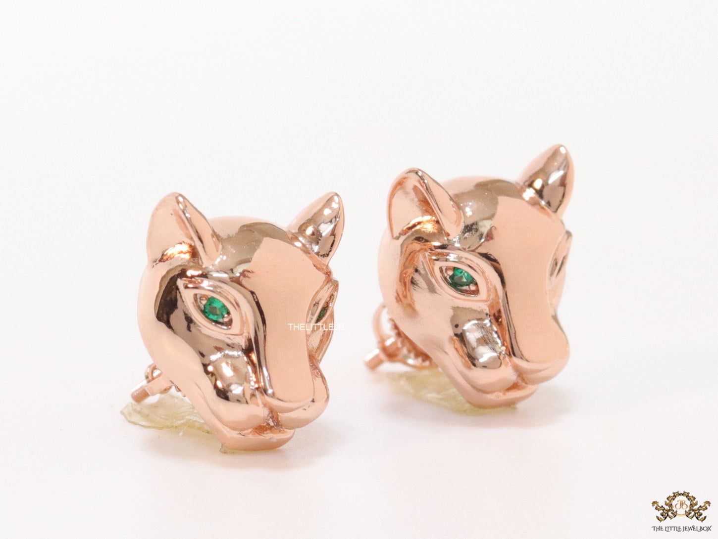 Rose gold panther face studs