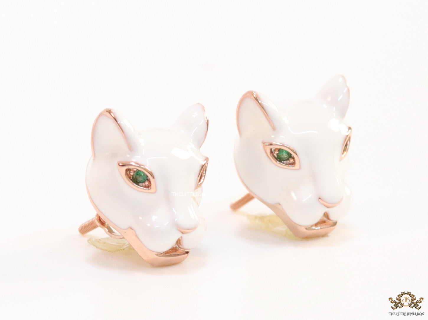 White and rose gold panther face studs