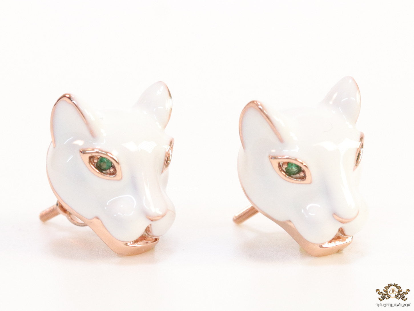 White and rose gold panther face studs