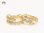 Gold serpentine hoops