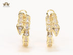 Gold serpentine hoops