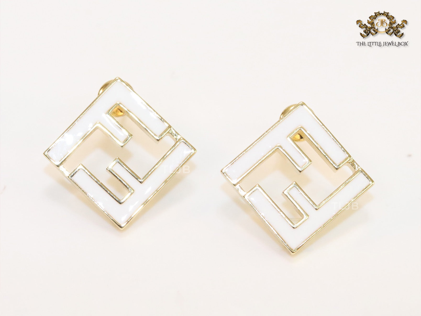White Double F gold studs