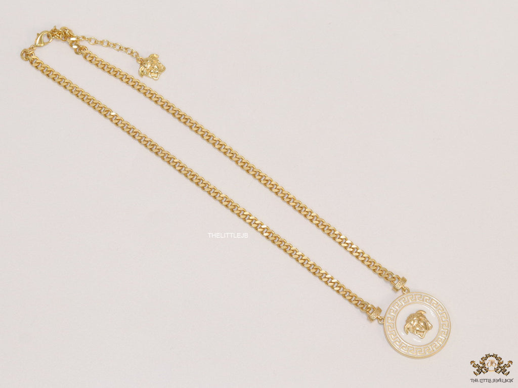Gold plated thick chain necklace with white and golden Medusa pendant