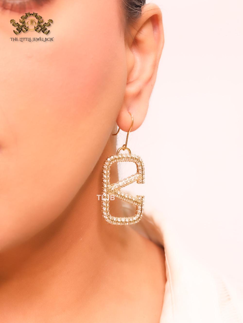 Alphabet open V cz and gold danglers