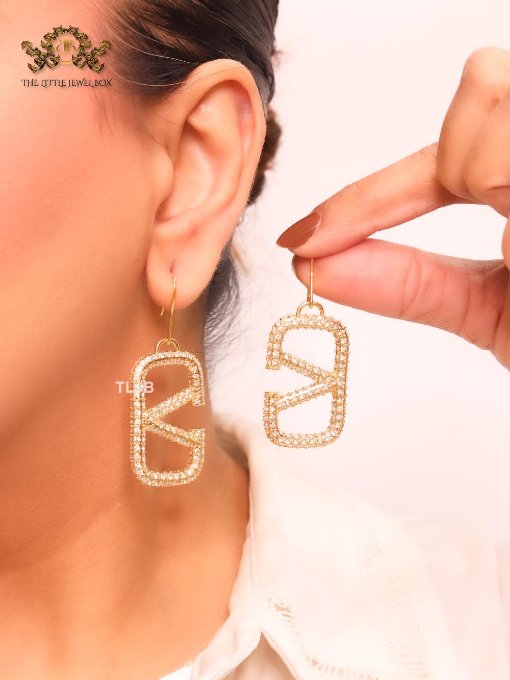 Alphabet open V cz and gold danglers