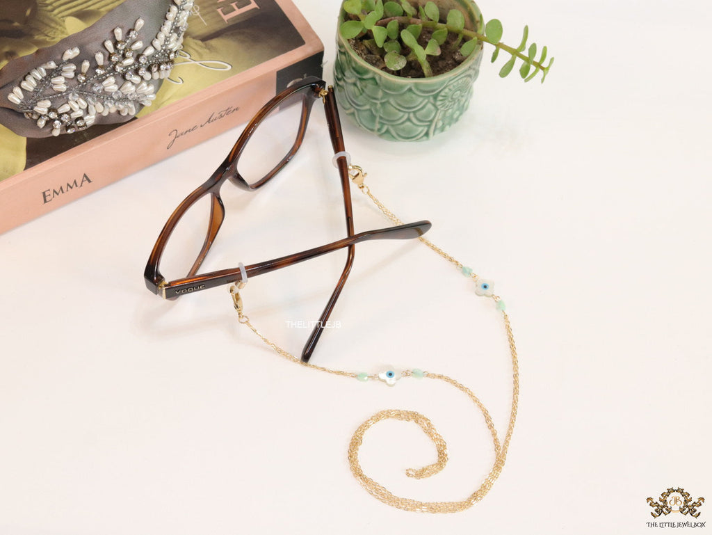 Golden mask chains with MOP evil eye clovers