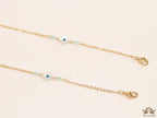 Golden mask chains with MOP evil eye clovers