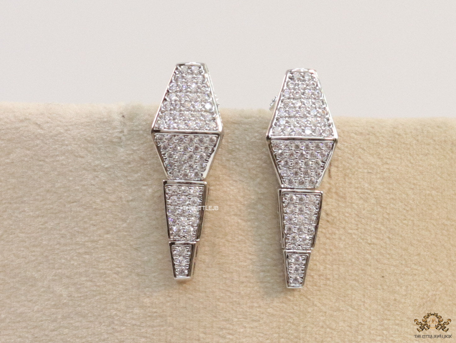 Platinum plated snake look knot necklace in cz