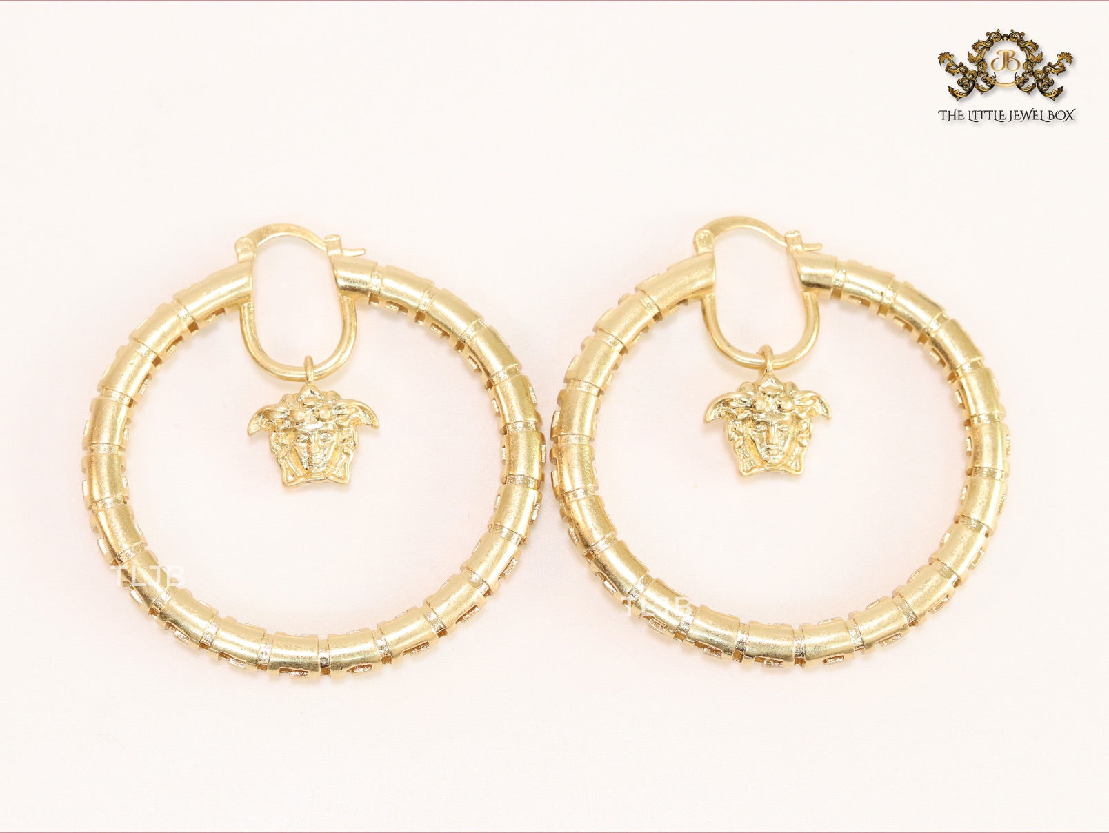 Medusa drop hoops