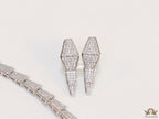 Platinum plated serpentine look knot necklace in cz