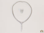 Platinum plated serpentine look knot necklace in cz