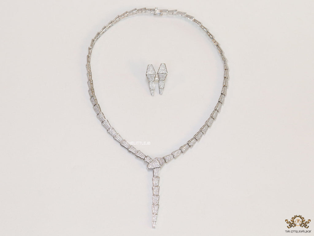 Platinum plated snake look knot necklace in cz