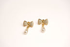 Alphabet V Bow Motif Long Pearl Dangler with CZ in Gold | Elegant Drop Earrings