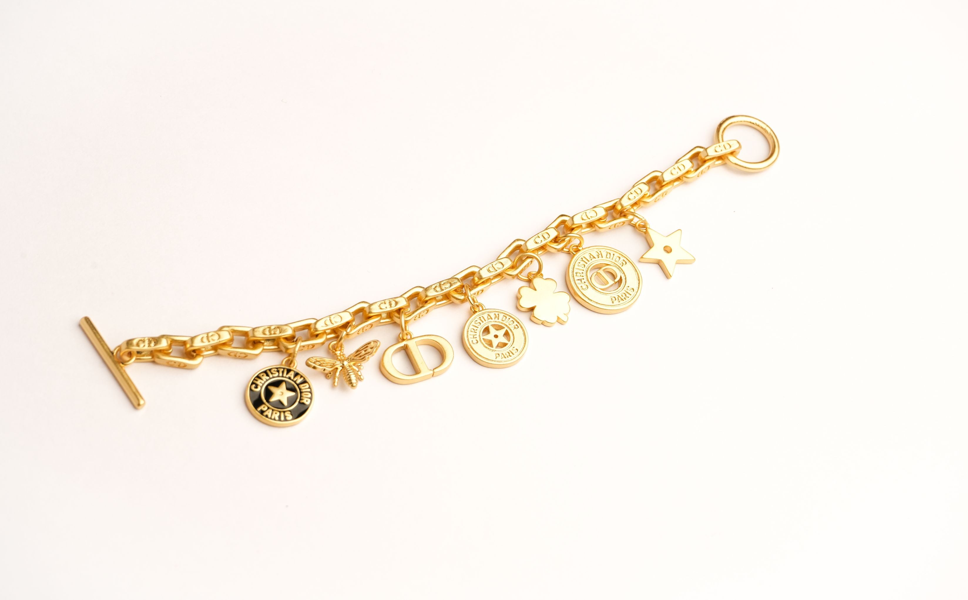 Alphabet CD Charms Bracelet in Matt Gold | Luxury Fashion Accessory