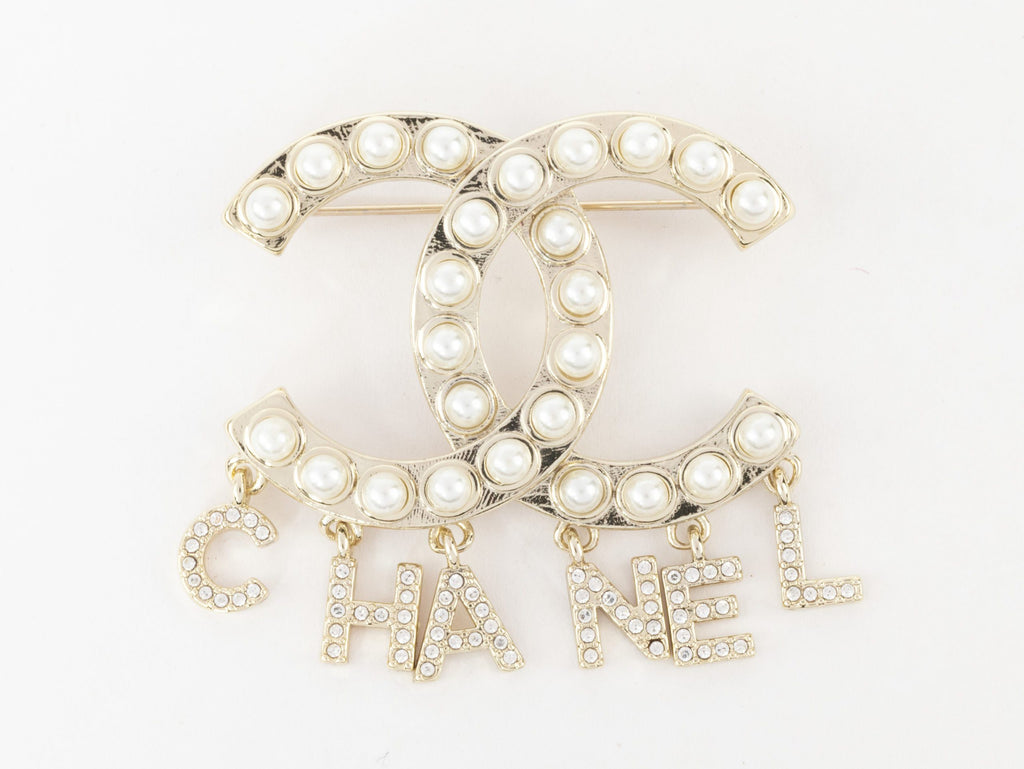 Platinum Double C pearl brooch with charms