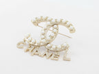 Platinum Double C pearl brooch with charms