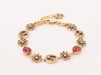 Rustic gold Double G and flowers bracelet with ruby