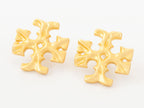 Gold earrings with T motifs matt finish clip ons