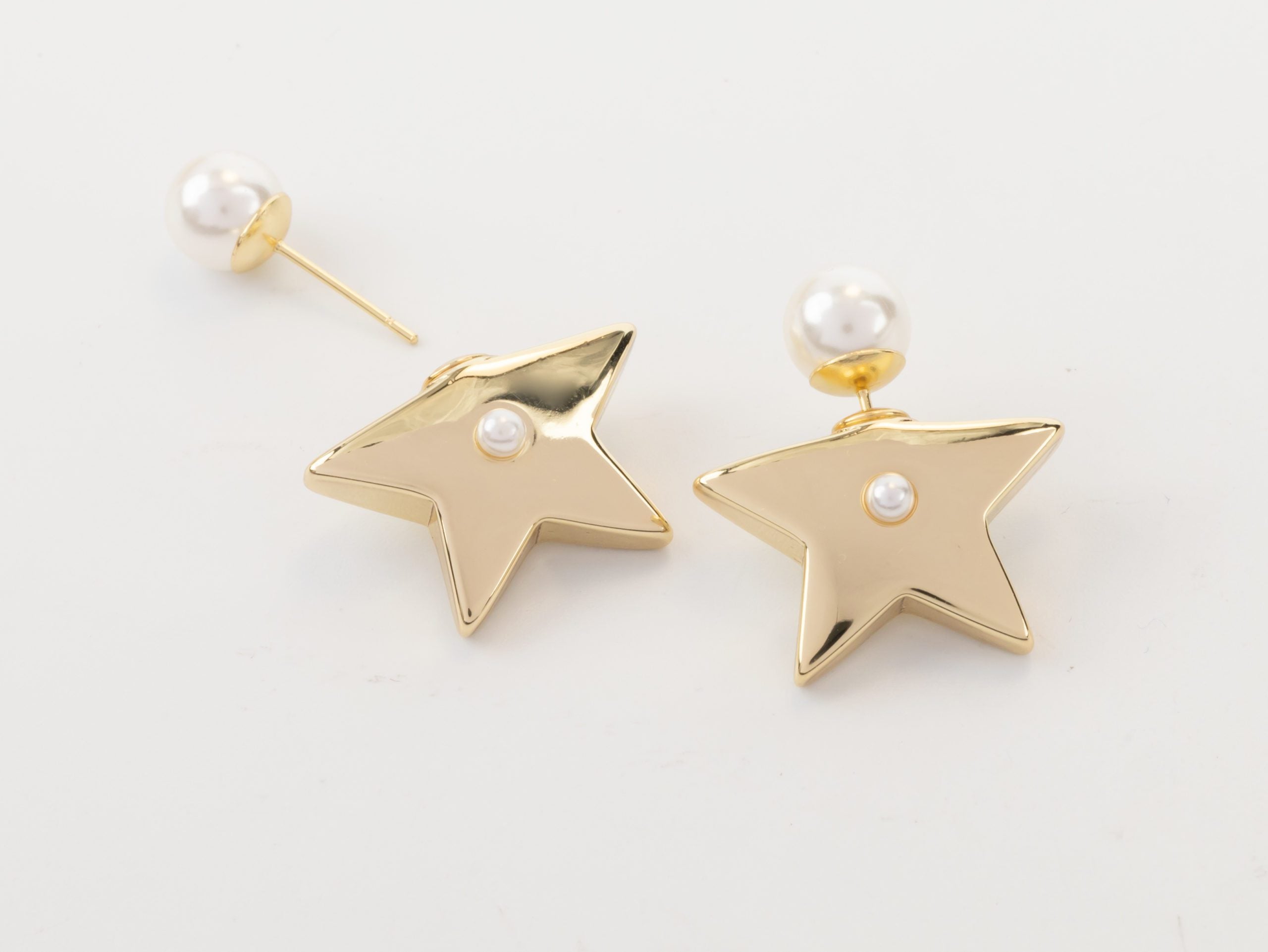 Gold stars with pearl detailing earrings