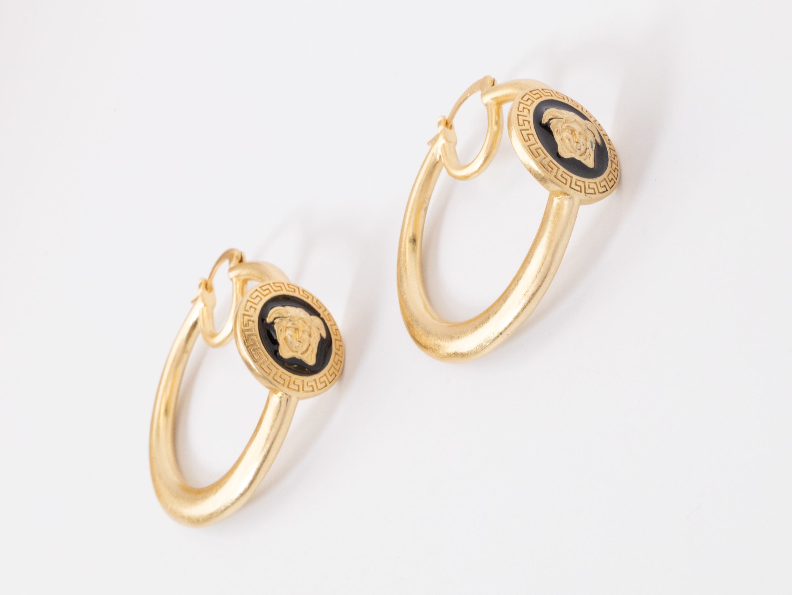 Gold Medusa on Black enamel hoops