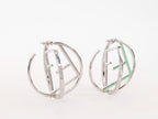 Half F platinum and green earrings hoops with CZ