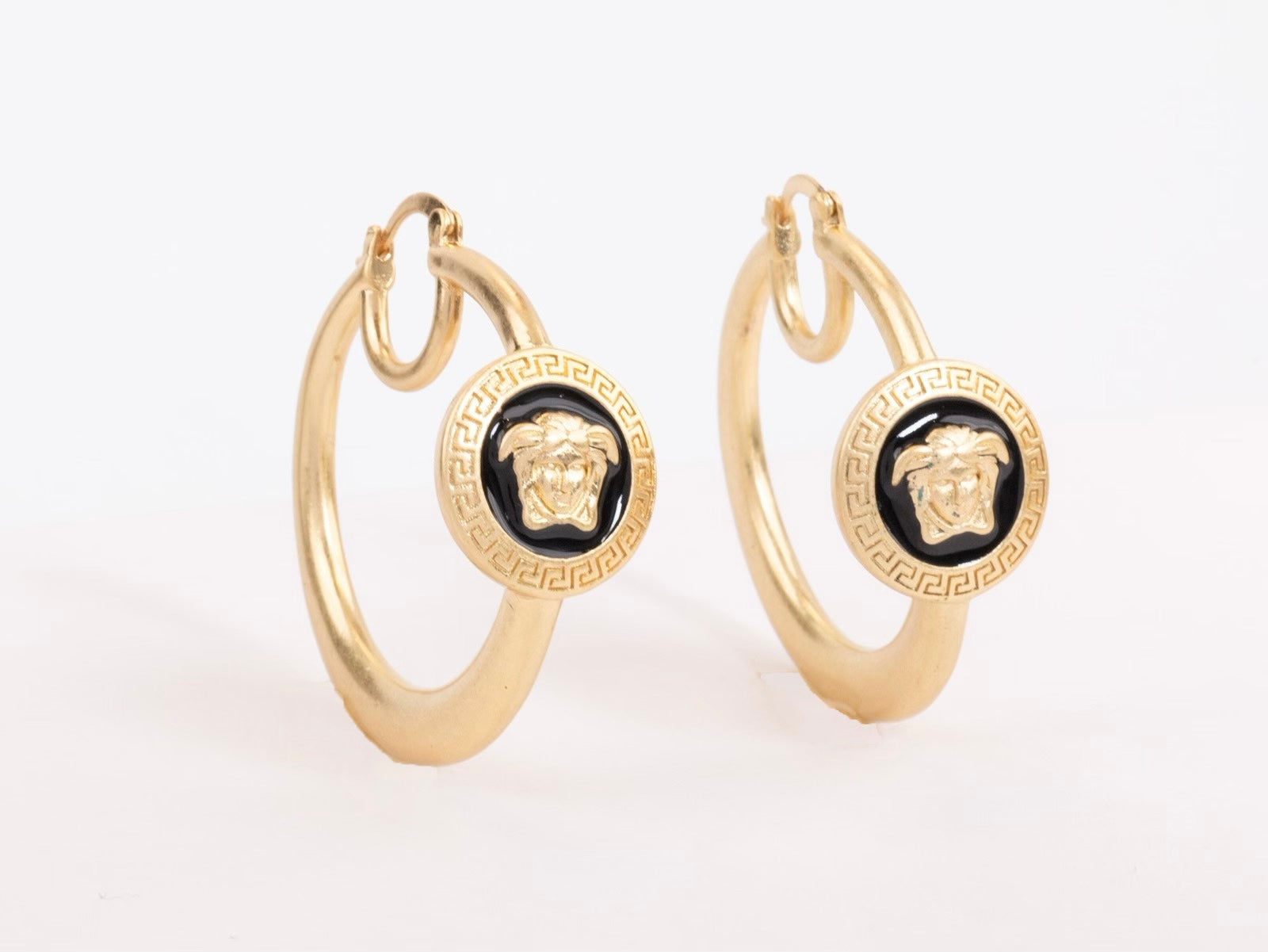 Gold Medusa on Black enamel hoops