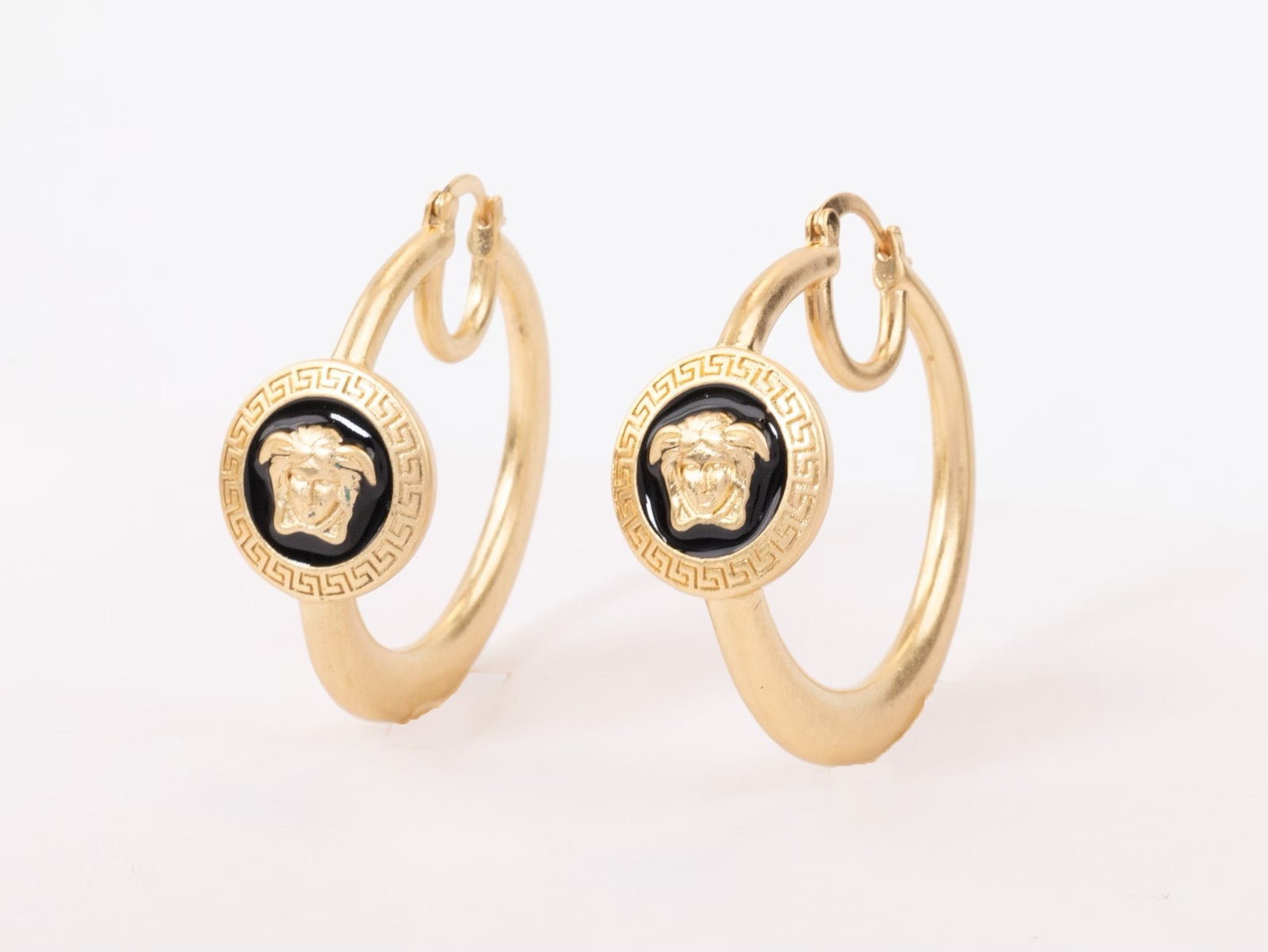 Gold Medusa on Black enamel hoops