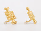 Gold earrings with T motifs matt finish clip ons