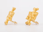 Gold earrings with T motifs matt finish clip ons