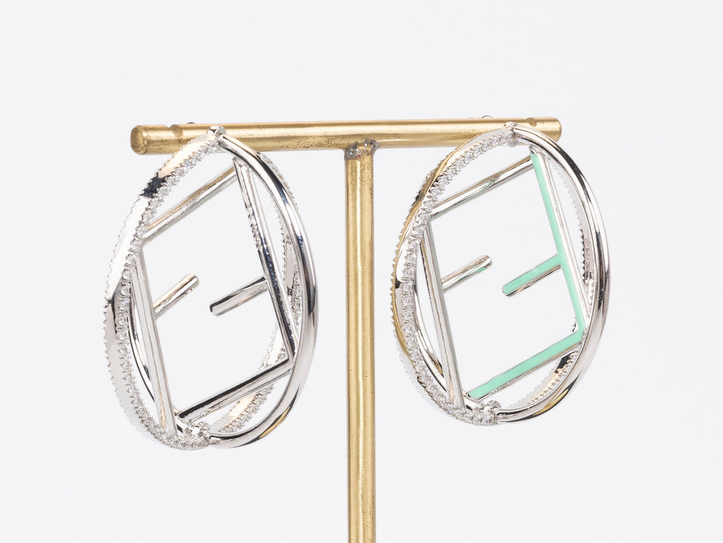 Half F platinum and green earrings hoops with CZ