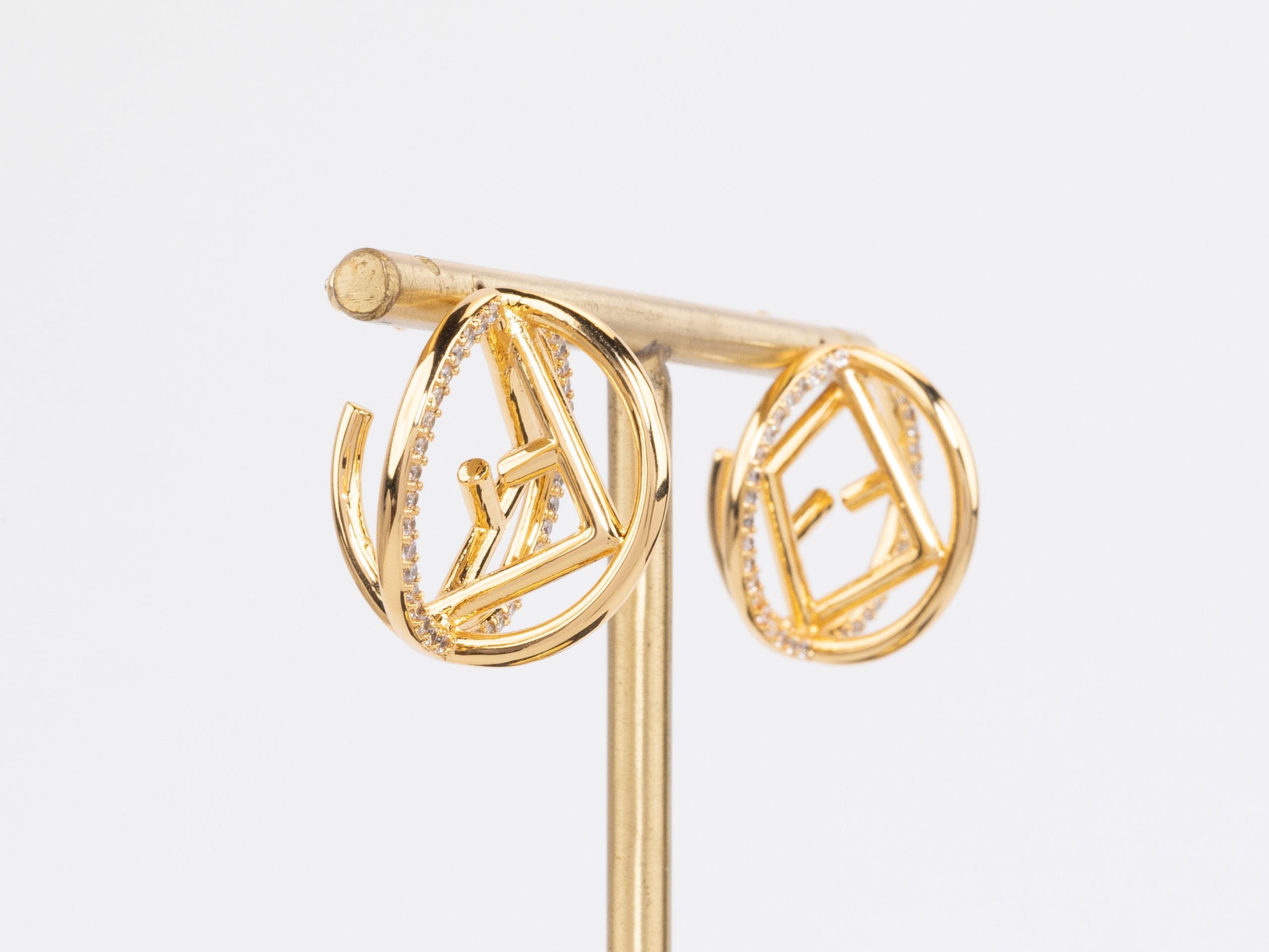 Half F gold earrings hoops with CZ