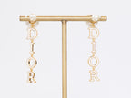 Long gold enamel alphabet C and D pearl earrings
