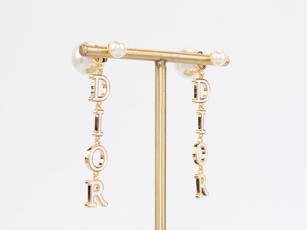Long gold enamel alphabet C and D pearl earrings