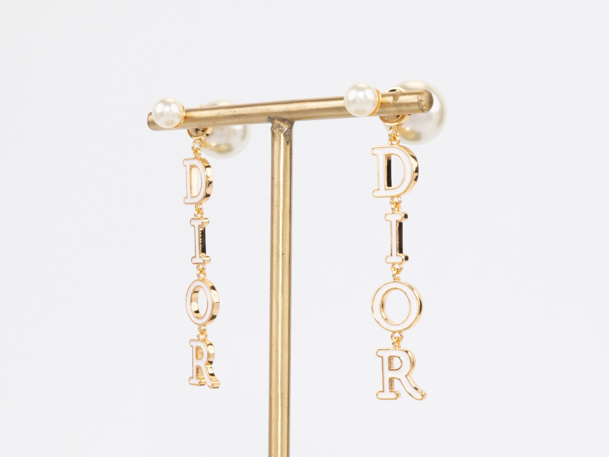 Long gold enamel alphabet C and D pearl earrings