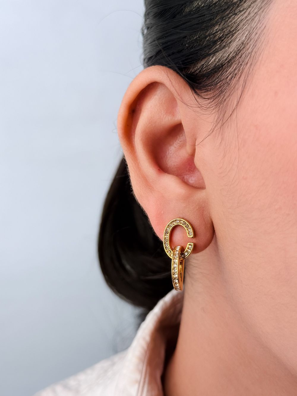Alphabet D drop earrings in gold