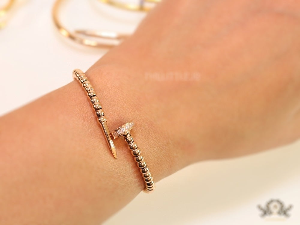 Rose gold plated cz and metallic bead nail bracelet-openable