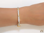 Gold plated openable bracelet studded with cz