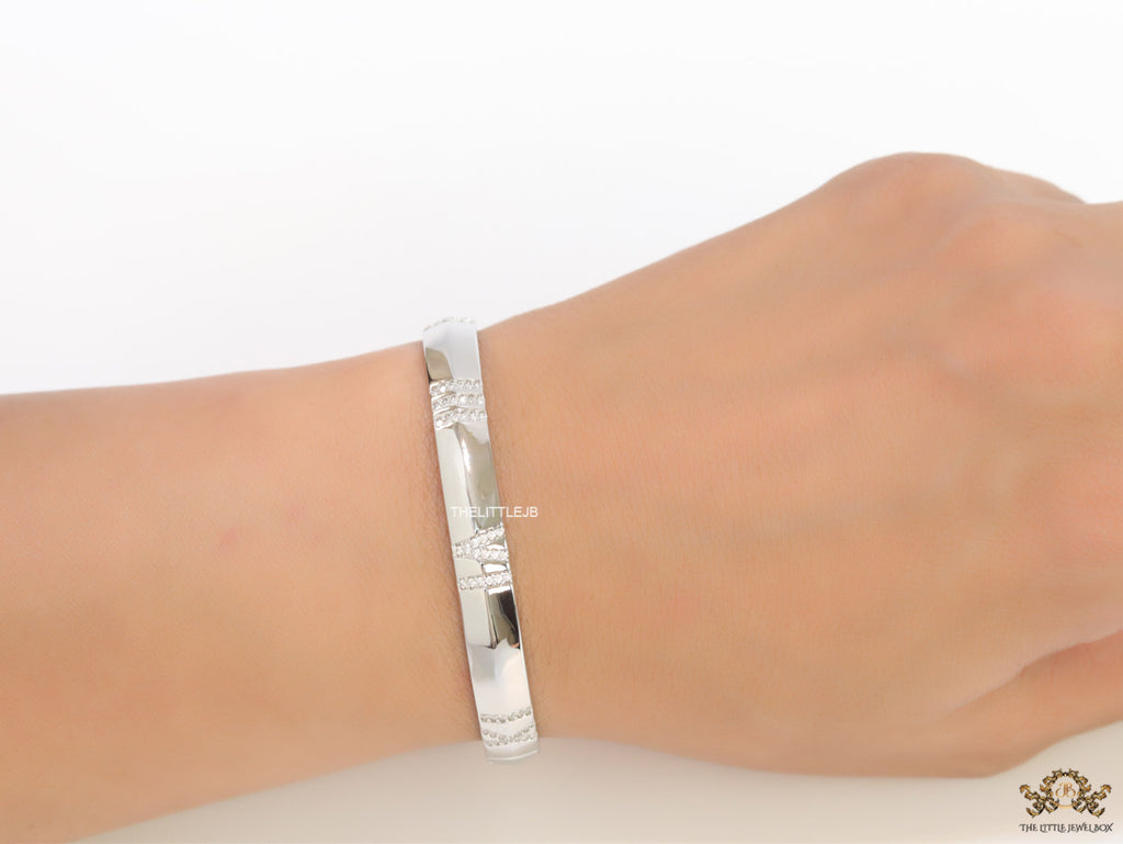 Platinum plated bracelet with cz roman numerals
