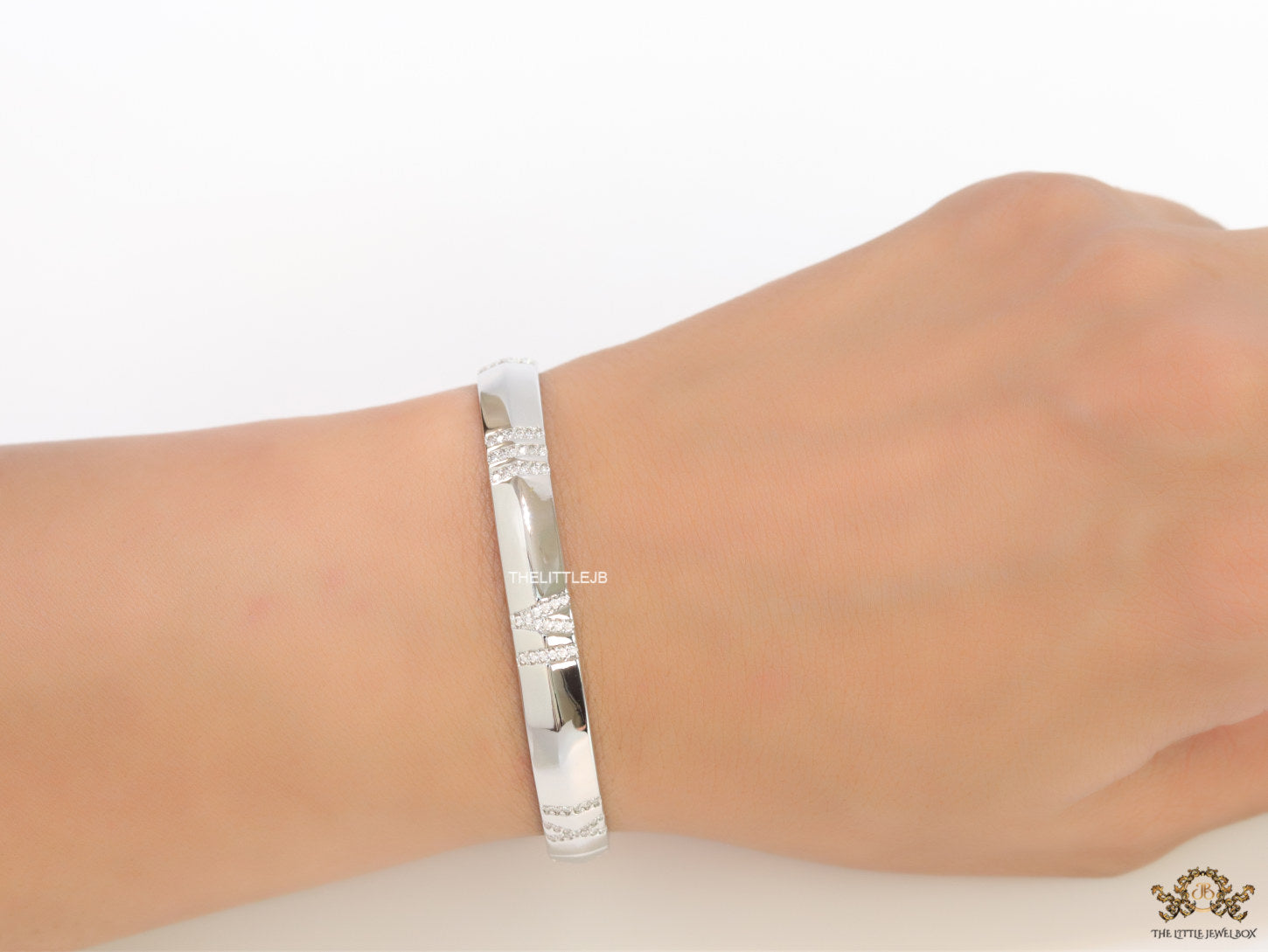 Platinum plated bracelet with cz roman numerals