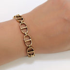 Openable golden Cand D motif bracelet